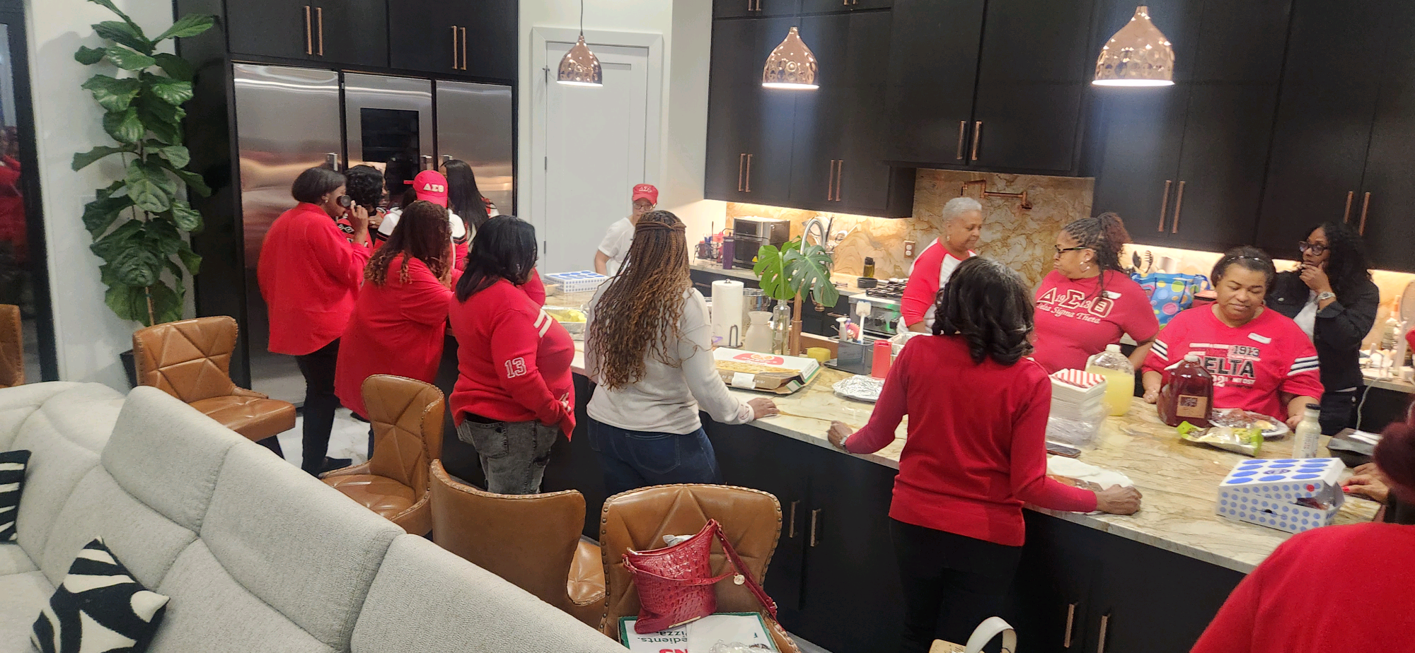 Sorors breaking bread together